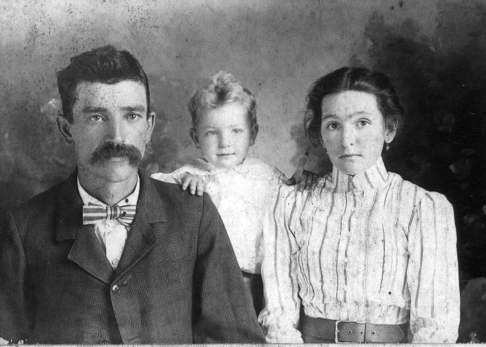 Text Box: 70. John Huffman, son,
      Hector, and wife, Ethel
      Wilborn.  ca. 1896
